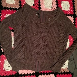 Nice sweater with working zipper up the back.